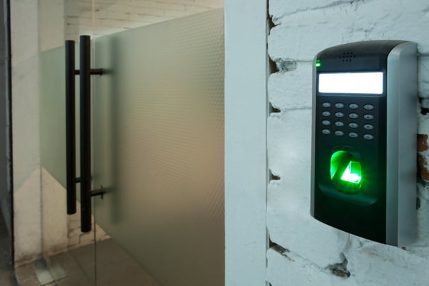 A-Security-Keypad-Outside-a-Building-Entrance-Door-GettyImages-171573656-1300w-867h