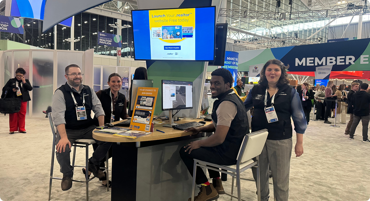 .RealEstate team manning the booth at NAR Mid Year